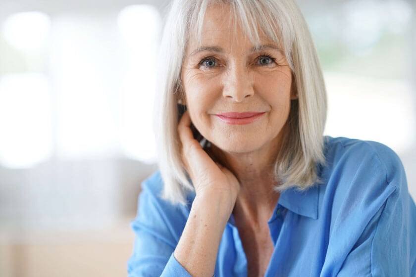 Older woman staring into camera