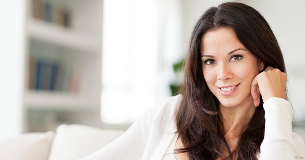 Brunette woman smiling at camera